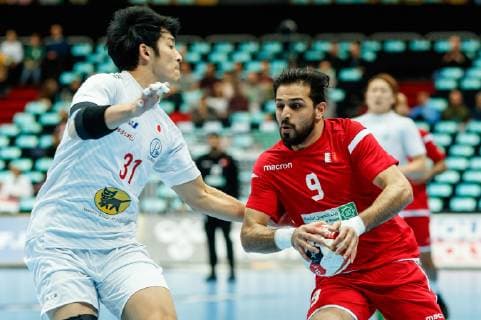 Munich Germany 17 01 2019 IHF Handball World Championship 2019 Group B Bahrain Japan Tatsuki Yoshino JPN and Al Samahiji BHR in the total DeFodi048