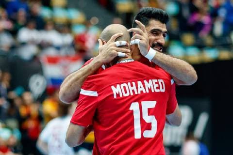 Munich Germany 17 01 2019 IHF Handball World Championship 2019 Group B Bahrain Japan Mohamed Abdulredha BHR and Jasim Alsalatna BHR final cheers DeFodi048