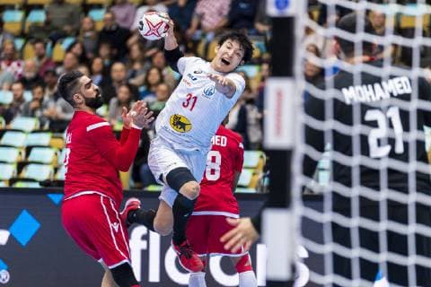 Munich Germany 17 January 2019 World Cup 2019 Men Group B Bahrain vs Japan Tatsuki Yoshino Japan Goalkeeper Mohamed A Husain Bahrain Munich Olympic Hall Bayern Germany