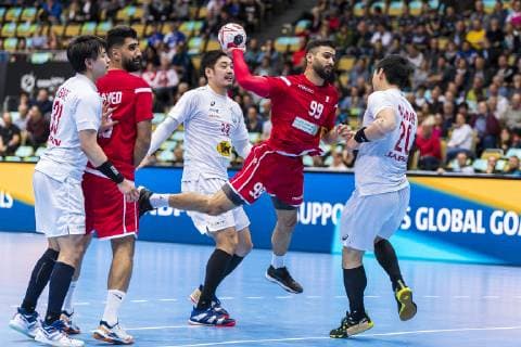 Munich Germany 17 January 2019 World Championship 2019 Men Group B Bahrain vs Japan Husain Alsayyad Bahrain litter Jin Watanabe Japan Munich Olympic Hall Bayern Germany