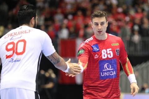 26th Mens Handball World Championship Austria vs Tunisia 17 01 19 Romas Kirveliavicius Austria 95 and Marouane Chouiref Tunisia 90 xmmkx