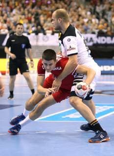 Milan Milic Serbia vs. Paul Drux Germany in the match Germany vs. Serbia Handball World Championship 2019 Mens Handball on 17 01 2019 in the Mercedes Benz Arena in Berlin Handball World Championship 2019 Group A Germany Serbia