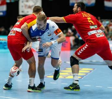 Munich Germany 17 01 2019 IHF Handball WM 2019 Group B Macedonia Iceland Velko Markoski MKD Aron Palmarsson ISL and Stojanche Stoilov MKD in the total DeFodi048