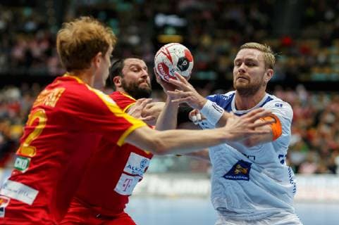 Munich Germany 17 01 2019 IHF Handball WM 2019 Group B Macedonia Iceland Martin Tomovski MKD Stojanche Stoilov MKD and Aron Palmarsson ISL in the duel DeFodi048
