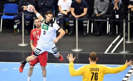 Uwe Gensheimer Germany in litter recht5s Vladimir Cupara goalkeeper Serbia rear Bogdan Radivojevic Serbia Germany Serbia Serbia IHF Handball World Championship 2019 Hanball World Championship 2019 men men men Handball Germany Germany Germany preliminary round group A group A Berlin 17 1 2019