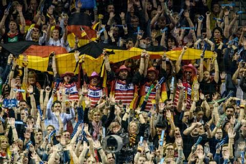 Germany vs. Serbia Handball World Championship 2019 17 01 2019 Fans of the German national team at La Ola with flag at the match between Germany and Serbia at the Handball World Championship in Berlin on 17 01 2019 Berlin BER Germany Mercedes Benz Arena