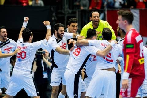 190117 Players of Tunisia celebrate while a player of Austria looks dejected after the IHF World Handball Championship match between Austria and Tunisia on January 17 2019 in Herning Photo Jon Olav Nesvold BILDBYR u0081N kod JE 160405,  Copyright: JONxOLAVxNESVOLD BB190117JE073