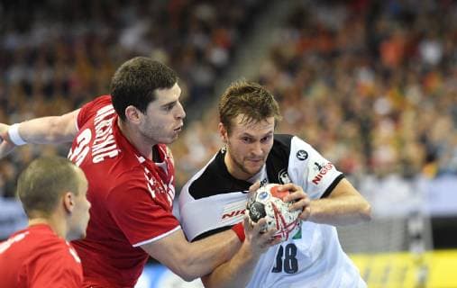 Fabian Böhm Germany with ball left Mijajlo Marsenic Serbia Vukasin Vorkapic Serbia Germany Serbia Germany Serbia IHF Handball World Championship 2019 Hanball World Championship 2019 Men Men Men Handball men Handball Germany Germany Preliminary Round Group A group A Berlin 17 1 2019
