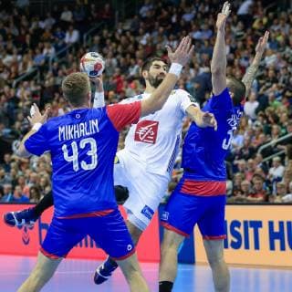 Germany Berlin Mercedes Benz Arena IHF Handball World Championship of Men France Nikola Karabatic FRA Russia Maksim Mikhalin Kmitrii Kiselev RUS