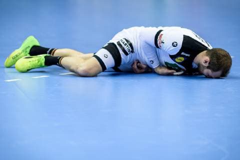 Germany vs. Serbia Handball World Championship 2019 17 01 2019 Steffen Faeth GER 23 on the ground at the match between Germany and Serbia at the Handball World Championship in Berlin on 17 01 2019 Berlin BER Germany Mercedes Benz Arena