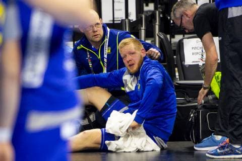 190117 Jim Gottfridsson of Sweden injured by the benches during the IHF World Handball Championship match between Sweden and Hungary on January 17 2019 in Copenhagen Photo Ludvig Thunman BILDBYR u0081N kod LT 35581,  Copyright: LUDVIGxTHUNMAN BB190117LT066