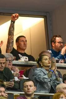 Germany Berlin Mercedes Benz Arena IHF Mens Handball World Championship 12 Silvio Heinevetter Germany GER Serbia SRB Stefan Kretzschmar and Sophia Thomalla cheer in the stands
