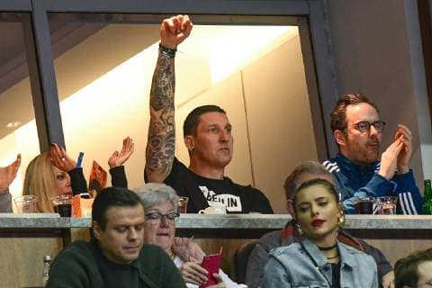 Germany Berlin Mercedes Benz Arena IHF Mens Handball World Championship 12 Silvio Heinevetter Germany GER Serbia SRB Stefan Kretzschmar and Sophia Thomalla cheer in the stands