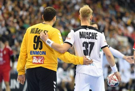 Dejan Milosavljev Goalkeeper Serbia and Matthias Musche Germany Arm in Arm Germany Serbia Serbia IHF Handball World Championship 2019 Hanball World Championship 2019 Men Men Men Handball men Handball Germany Germany Preliminary Round Group A group A Berlin 17 1 2019