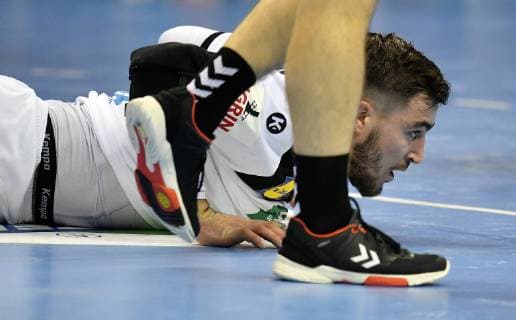 Jannik Kohlbacher Germany after a jump shot and goal on ground Germany Serbia Germany Serbia IHF Handball World Championship 2019 Hanball World Championship 2019 Men Men Men Men Handball Germany Germany Preliminary Round Group A group A Berlin 17 1 2019