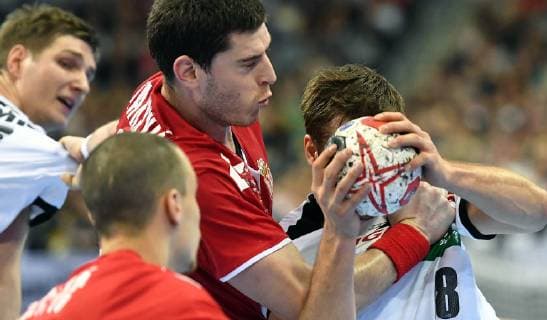 Fabian Böhm Germany with ball left Mijajlo Marsenic Serbia Vukasin Vorkapic Serbia Finn Lemke Germany Germany Serbia Serbia IHF Handball World Championship 2019 Hanball World Championship 2019 Men Men Men Handball Germany Germany Germany Preliminary Round Group A group A Berlin 17 1 2019
