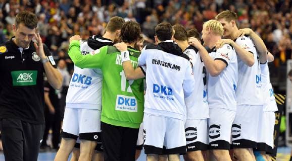 Christian Prokop coach Germany thoughtfully after the game right the cheering German team Germany Serbia Germany Serbia IHF Handball World Championship 2019 Hanball World Championship 2019 men men men men Handball Germany Germany preliminary round group A group A Berlin 17 1 2019