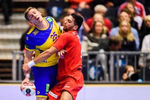 190119 Linus Arnesson of Sweden in a duel with Ramzi Majdoub of Tunisia during the IHF World Handball Championship match between Tunisia and Sweden on January 19 2019 in Herning Photo Petter Arvidson BILDBYR u0081N kod PA 92204,  Copyright: PETTERxARVIDSON BB190119PA043