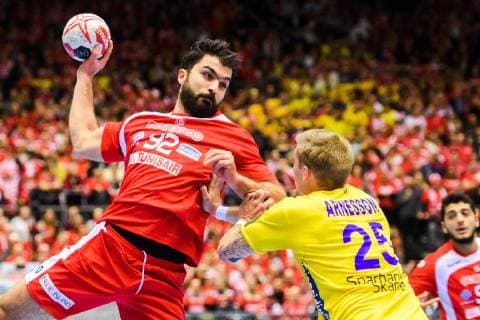190119 Oussama Jaziri of Tunisia and Linus Arnesson of Sweden during the IHF World Handball Championship match between Tunisia and Sweden on January 19 2019 in Herning Photo Petter Arvidson BILDBYR u0081N kod PA 92204,  Copyright: PETTERxARVIDSON BB190119PA050