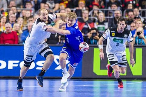 Cologne Germany 19 January 2019 World Cup 2019 Men Main Round Germany vs Iceland v left in duel Paul Drux Germany Fox Berlin and Gisli Thorgeir Kristjansson Island Cologne Lanxess Arena North Rhine-Westphalia Germany