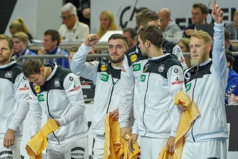 GER IHF WM 2019 Germany GER vs Iceland ISL 19 01 2019 Lanxess Arena Cologne GER IHF WM 2019 Germany GER vs Iceland ISL picture shows deutsche Bank is happy Matthias Musche GER 37 Hendrik Pekeler GER 13 Jannik Kohlbacher GER 48 nordphotox xMeuter nph00351