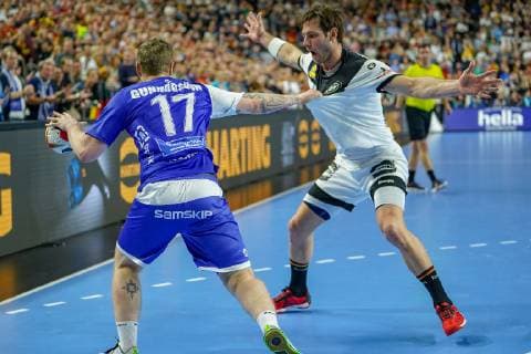 GER IHF WM 2019 Germany GER vs Iceland ISL 19 01 2019 Lanxess Arena Cologne GER IHF WM 2019 Germany GER vs Iceland ISL picture shows Arnor Gunnarsson ISL 17 in duel against Uwe Gensheimer GER 3 nordphotox xMeuter nph00351