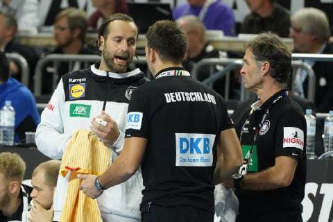 GER IHF WM 2019 Germany GER vs Iceland ISL 19 01 2019 Lanxess Arena Cologne GER IHF WM 2019 Germany GER vs Iceland ISL picture shows Christian Prokop Headcoach Coach GER and Co Coach Alexander Haase GER talk to Silvio Heinevetter Goalkeeper GER 12 nordphotox xMeuter nph00351