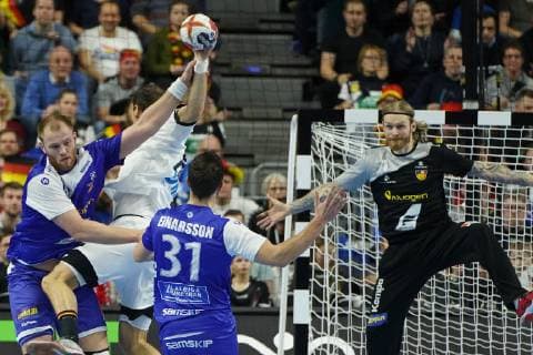 GER IHF WM 2019 Germany GER vs Iceland ISL 19 01 2019 Lanxess Arena Cologne GER IHF WM 2019 Germany GER vs Iceland ISL in picture picture shows the litter of Kai Häfner Haefner GER 25 is fended off here nordphotox xMeuter nph00351