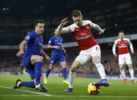 (190120) -- LONDON, Jan. 20, 2019 (Xinhua) -- Chelsea s Cesar Azpilicueta (L) competes with Arsenal s Aaron Ramsey during the 23th round English Premier League match between Arsenal and Chelsea at the Emirates Stadium in London, Britain on Jan. 19, 2019. Arsenal won 2-0. (Xinhua ) FOR EDITORIAL USE ONLY. NOT FOR SALE FOR MARKETING OR ADVERTISING CAMPAIGNS. NO USE WITH UNAUTHORIZED AUDIO, VIDEO, DATA, FIXTURE LISTS, CLUB LEAGUE LOGOS OR LIVE SERVICES. ONLINE IN-MATCH USE LIMITED TO 45 IMAGES, NO VIDEO EMULATION. NO USE IN BETTING, GAMES OR SINGLE CLUB LEAGUE PLAYER PUBLICATIONS. (SP)BRITAIN-LONDON-FOOTBALL-PREMIER LEAGUE-ARSENAL VS CHELSEA - ZUMA XxjpbeE007145_20190120_PEPFN0A001 Copyright: xMatthewxImpeyx