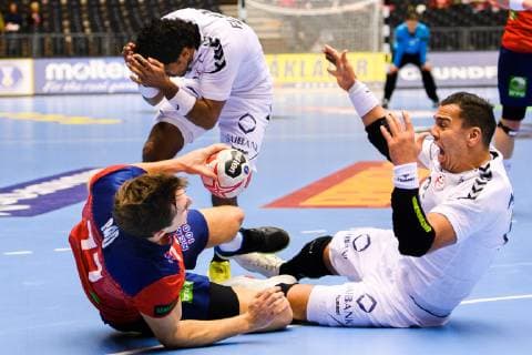 190120 Magnus Abelvik R¿d of Norway collides with Mohamed Shebib and Omar Elwakil of Egypt during the IHF World Handball Championship match between Norway and Egypt on January 20 2019 in Herning Photo Petter Arvidson BILDBYR u0081N kod PA 92208,  Copyright: PETTERxARVIDSON BB190120PA086