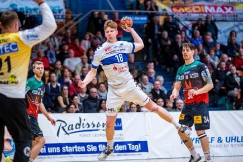 Johannes Wasielewskie 18 Dessau Rosslauer HV 06 on the ball with Daniel Pettersson 11 SC Magdeburg l and Michael Damgaard 34 SC Magdeburg r during the 20 Peugeot Cup in the match between Dessau Rosslauer HV 06 and SC Magdeburg in the Anhalt Arena on 20 January 2019 in Bauhausstadt Dessau Sachsen Anhalt Saxony Anhalt Germany HB TU 20 Peugeot Cup 2019 Dessau Copyright: xEIBNER HartmutxBoesenerx EP_HBR