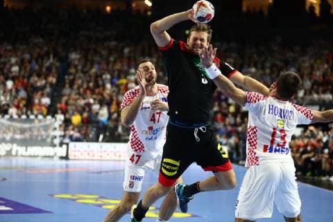 Fabian Boehm Germany in duel with Jakow Vrankovic Croatia and Zlatko Horvat Croatia Croatia vs. Germany IHF Men Handball World Championship 21 01 2019 Photographer Neis Eibner Croatia vs. Germany IHF Men Handball World Championship 21 01 2019 Cologne Copyright: xEIBNER Alexander_Neisx EP_ANS