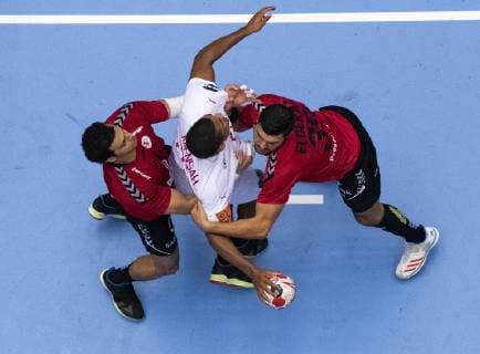 January 21, 2019 - Herning, Denmark - Mads Mensah (22), Denmark is blocked by Yehia Elder, Egypt during the group C handball match between Egypt and Denmark in Jyske Bank Boxen in Herning during the 2019 IHF Handball World Championship WM Weltmeisterschaft in Germany Denmark. Handball 2019: Egypt-Denmark - ZUMAm173 20190121_zsp_m173_009 Copyright: xLarsxMoellerx