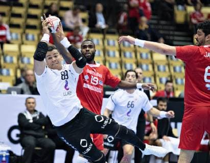 Mohamed Shebib of Egypt goes past Mosbah Sanai of Tunisia during the men s IHF Handball World Championship Main Round Group 2 match between Tunisia and Egypt in Herning Denmark Wednesday Jan 23 2019 Herning Jylland Denmark,  Copyright: HenningxBagger HenningxBaggerx COP103 spdk20190123-160846-L