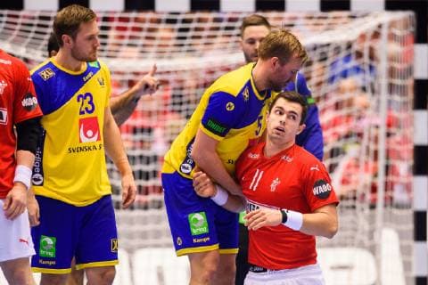 190123 Max Darj of Sweden helps Rasmus Lauge of Denmark during the IHF World Handball Championship match between Denmark and Sweden on January 23 2019 in Herning Photo Petter Arvidson BILDBYR u0081N kod PA 92213,  Copyright: PETTERxARVIDSON BB190123PA054