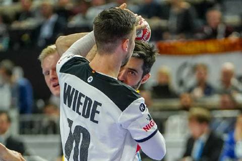 GER IHF WM 2019 Germany GER vs. Spain ESP 23 01 2019 Lanxess Arena Cologne GER IHF WM 2019 Germany GER vs. Spain ESP in picture picture shows Fabian Wiede GER 10 holds a Spaniard nordphotox xMeuter nph00351