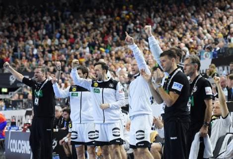 The German bank around national coach Christian Prokop r GER and team manager Oliver Roggisch l GER cheer main round Germany Spain in Cologne Germany on 23 01 2019 IHF Handball World Mens Championship in Germany and Denmark 2019