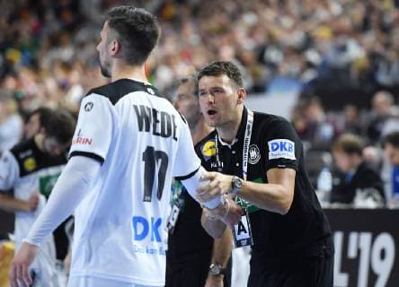 National Coach Christian Prokop GER speaks to Fabian Wiede 10 GER Main Round Germany Spain in Cologne Germany on 23 01 2019 IHF Mens Handball World Championship in Germany and Denmark 2019