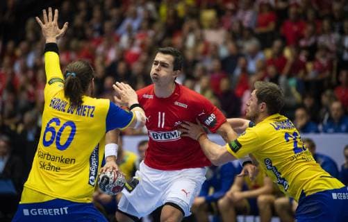 January 23, 2019 - Herning, Denmark - Kim Ekdahl du Rietz, Sweden and Albin Lagergren, Sweden are blocking Rasmus Lauge (11), Denmark during the group C handball match between Denmark and Sweden in Jyske Bank Boxen in Herning during the 2019 IHF Handball World Championship WM Weltmeisterschaft in Germany Denmark. Handball 2019: Denmark-Sweden - ZUMAm173 20190123_zsp_m173_020 Copyright: xLarsxMoellerx