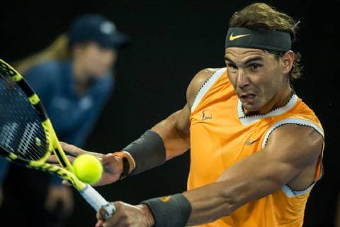 MELBOURNE, AUSTRALIA - JANUARY 24 : Rafael Nadal of ÊSpain returns the ball during the semifinals on day 11 of the Australian Open on January 24 2019, at Melbourne Park in Melbourne, Australia.(Photo by Jason Heidrich Icon Sportswire) TENNIS: JAN 24 Australian Open Icon19012423211 EDITORIAL USE ONLY