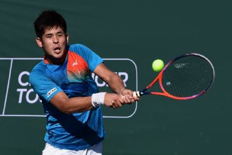 NEWPORT BEACH, CA - JANUARY 24: Kaichi Uchida (JPN) returns a shot in a match played during the Oracle Challenger Series, on January 24, 2019, at the Newport Beach Tennis Club in Newport Beach, CA. (Photo by John Cordes Icon Sportswire) TENNIS: JAN 24 Oracle Challenger Series Icon506190124026 EDITORIAL USE ONLY