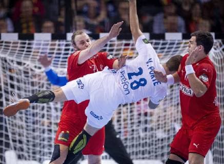 Henrik Moellgaard and Rasmus Lauge of Denmark and Valentin Porte of France during the men s IHF Handball World Championship semifinal between Denmark France in Hamburg Germany on Friday Jan 25 2019 Hamburg Denmark,  Copyright: Scanpix LiselottexSabroex COP102 spdk20190125-182810-L