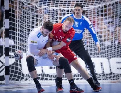 Henrik Toft Hansen of Denmark and Michael Guigou of France during the men s IHF Handball World Championship semifinal between Denmark France in Hamburg Germany on Friday Jan 25 2019 Hamburg Denmark,  Copyright: Scanpix LiselottexSabroex COP102 spdk20190125-184729-L