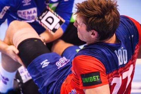 190125 Magnus Abelvik R¿d of Norway receives help after injury during the IHF World Handball Championship match between Germany and Norway on January 25 2019 in Hamburg Photo Ludvig Thunman BILDBYR u0081N kod LT 35585,  Copyright: LUDVIGxTHUNMAN BB190125LT093