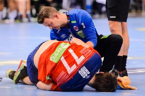 190125 Magnus Abelvik R¿d of Norway receives help after injury during the IHF World Handball Championship match between Germany and Norway on January 25 2019 in Hamburg Photo Ludvig Thunman BILDBYR u0081N kod LT 35585,  Copyright: LUDVIGxTHUNMAN BB190125LT094