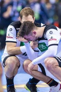 Hamburg Germany 25 January 2019 WM 2019 Men Semifinals Germany vs Norway Steffen Weinhold Germany THW Kiel comforts Fabian Wiede Germany Fox Berlin Hamburg Barclaycard Arena Germany