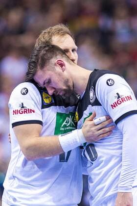 Hamburg Germany 25 January 2019 WM 2019 Men Semifinals Germany vs Norway Steffen Weinhold Germany THW Kiel comforts Fabian Wiede Germany Fox Berlin Hamburg Barclaycard Arena Germany
