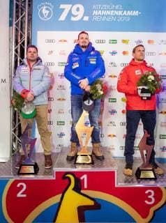 25 01 2019 Streif Kitzbuehel AUT FIS World Cup Alpine Ski Downhill Mens Downhill Mens Award Ceremony in picture v l Beat Feuz SUI 2 place Dominik Paris ITA 1 place Otmar Striedinger AUT 3 place f l second placed Beat Feuz of Switzerland race winner Dominik Paris of Italy third placed Otmar Striedinger of Austria during the winner Ceremony for the men s Downhill of FIS Ski Alpine World Cup at the Streif in Kitzbuehel Austria on 2019 01 25 Kitzbuehel  EX_GRO