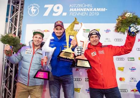 25 01 2019 Streif Kitzbuehel AUT FIS World Cup Alpine Ski Downhill Mens Downhill Mens Award Ceremony in picture v l Beat Feuz SUI 2 place Dominik Paris ITA 1 place Otmar Striedinger AUT 3 place f l second placed Beat Feuz of Switzerland race winner Dominik Paris of Italy third placed Otmar Striedinger of Austria during the winner Ceremony for the men s Downhill of FIS Ski Alpine World Cup at the Streif in Kitzbuehel Austria on 2019 01 25 Kitzbuehel  EX_GRO