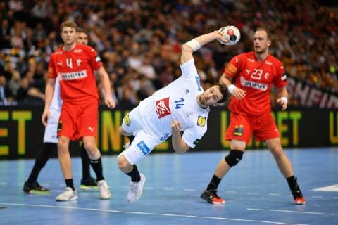 (190126) -- HAMBURG, Jan. 26, 2019 -- Kentin Mahe (C) of France shoots during the IHF Men s Handball World Championship WM Weltmeisterschaft semifinals between Denmark and France in Hamburg, Germany, on Jan. 25, 2019. Denmark won 38-30. ) ) (SP)GERMANY-HAMBURG-MEN S HANDBALL-WORLD CHAMPIONSHIP-SEMIFINAL UlrichxHufnagel 
